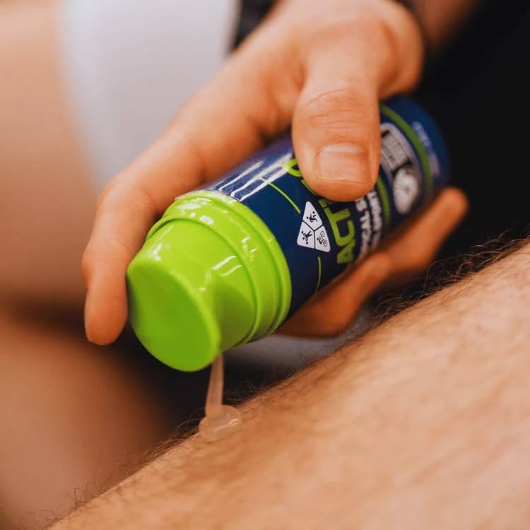 LactiGo gel being applied to a leg from the bottle